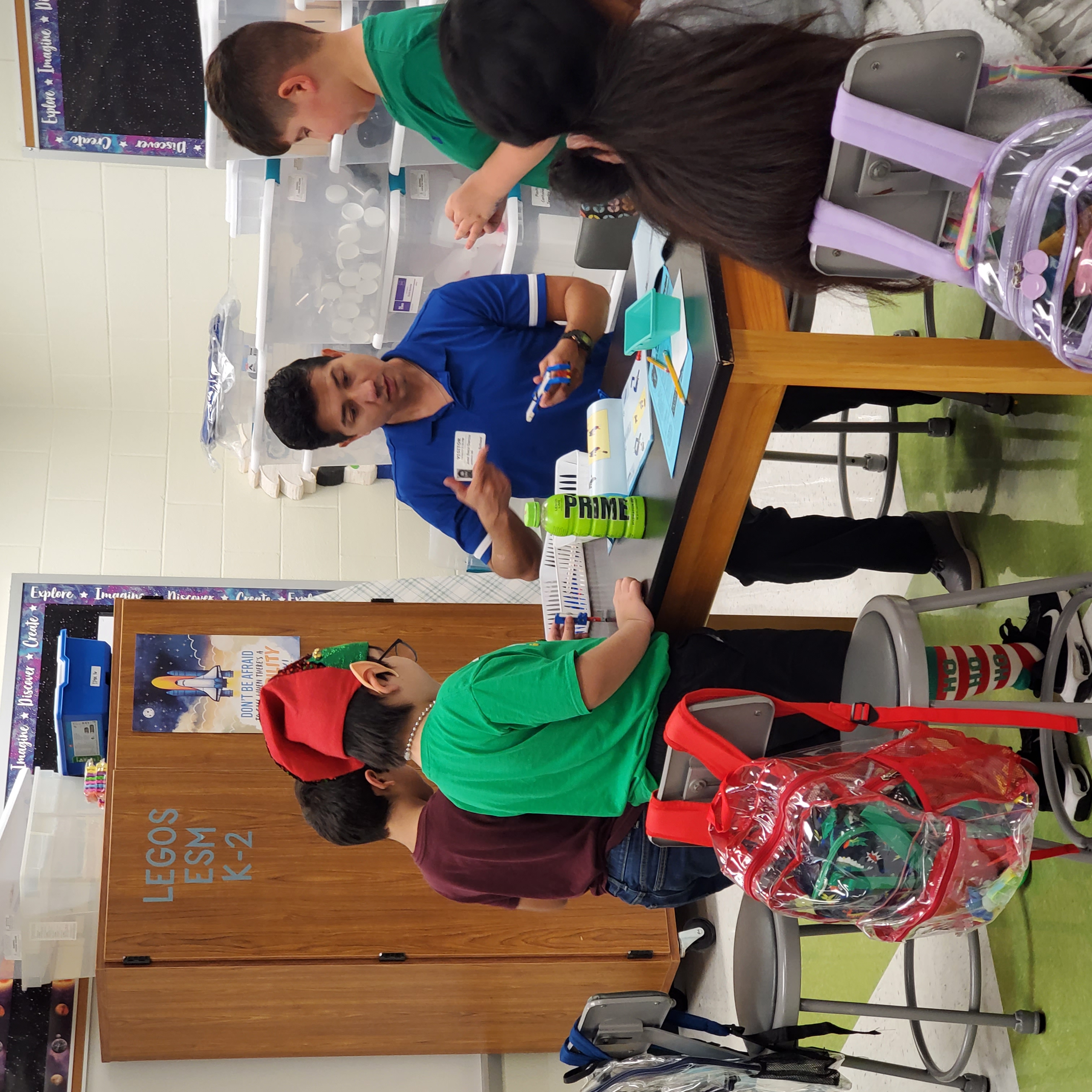 teacher guiding students