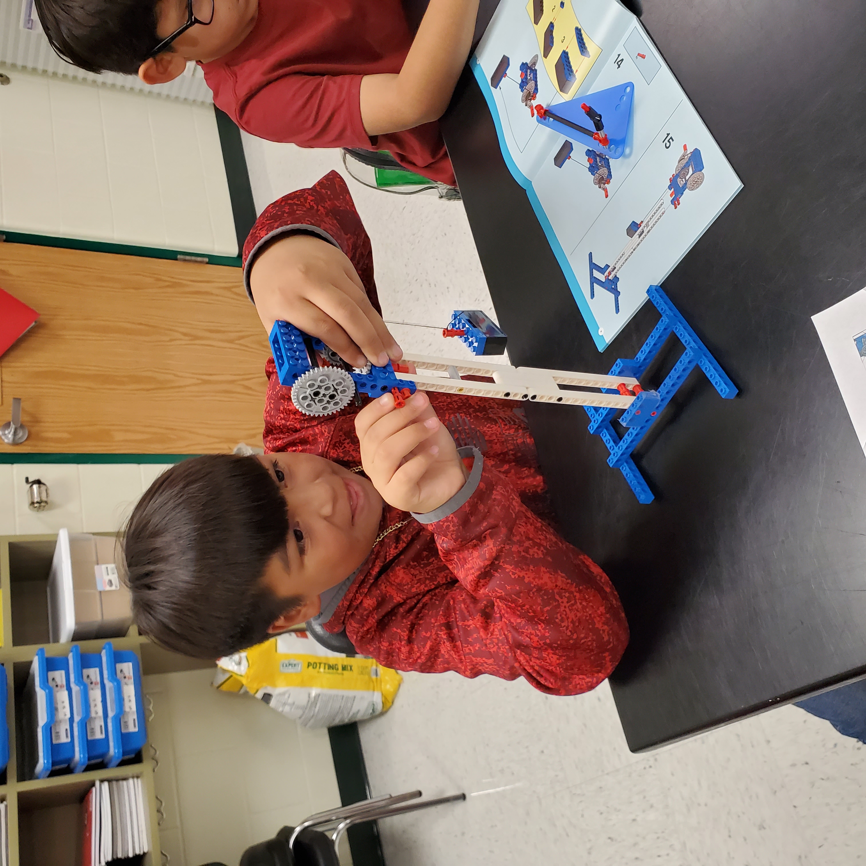 male student working on project