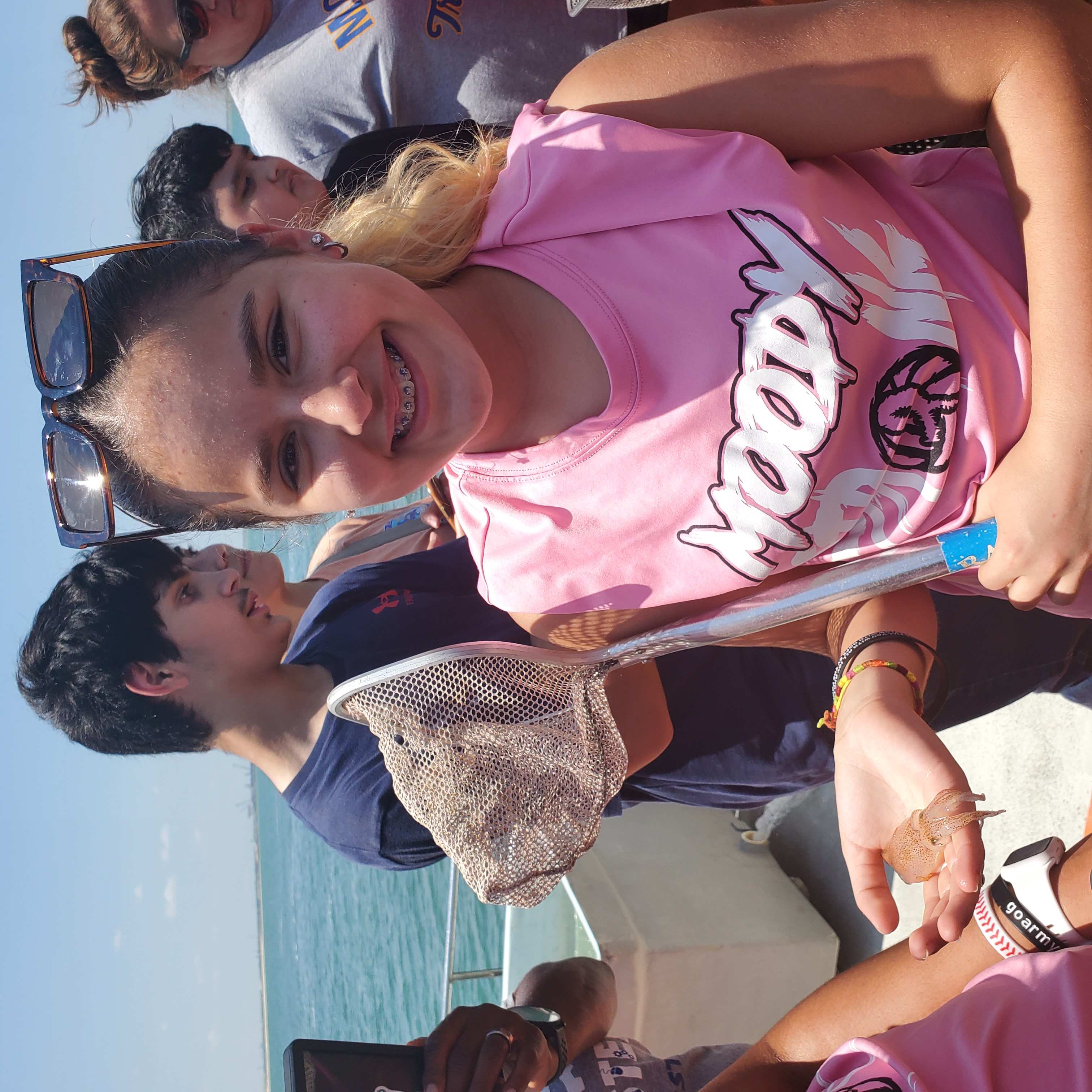 holding a squid