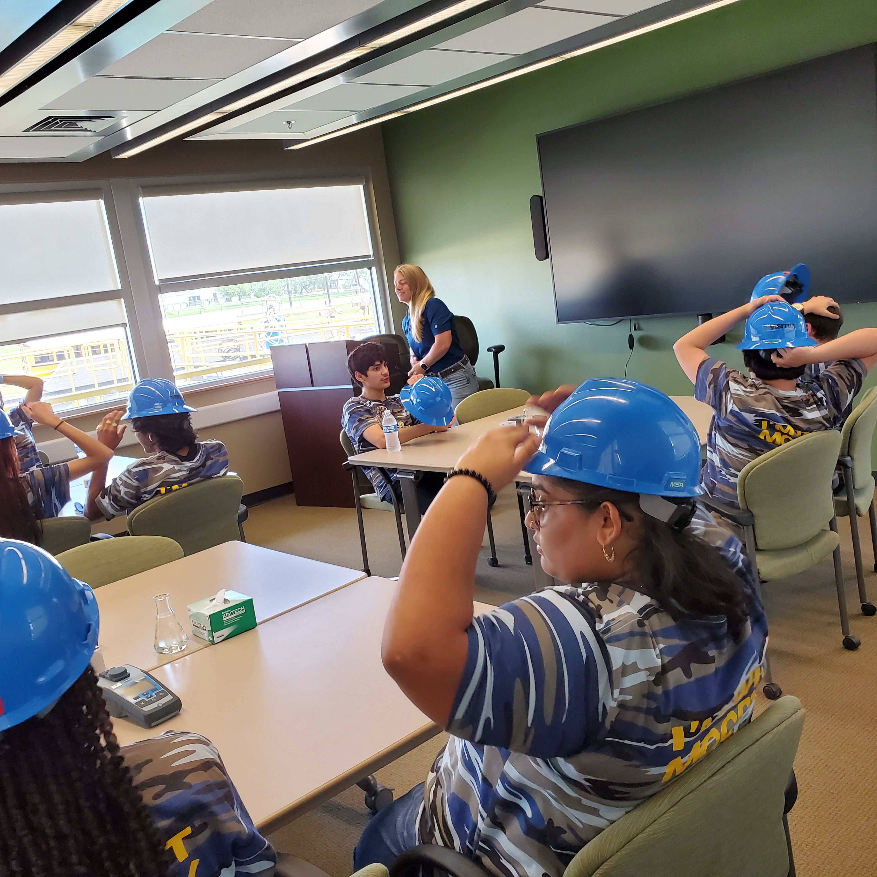 students with hard hats