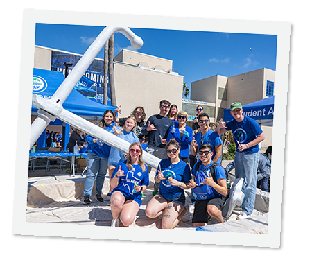 Students in front of the painted anchor