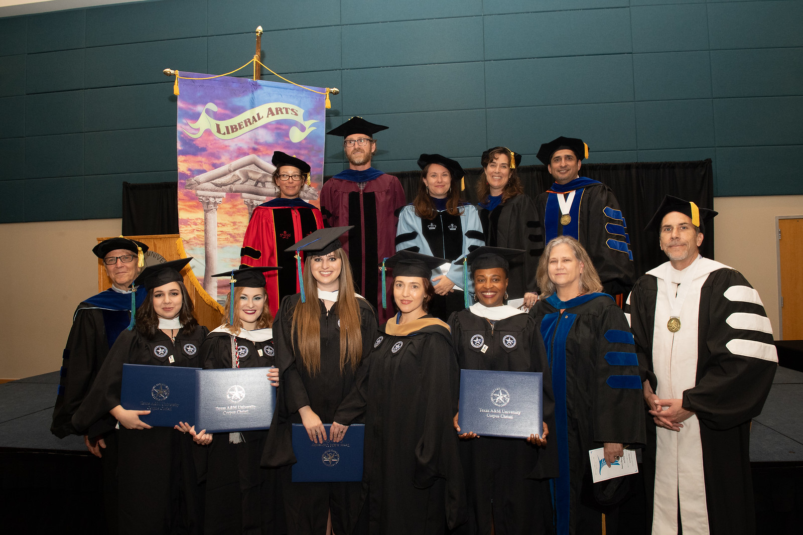 English faculty and hooding graduates group photo