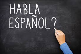 Habla Espanol on chalkboard