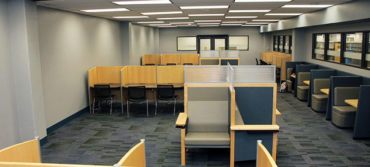 Inside Super Quiet Study room showing study carrels, chairs, and other seating