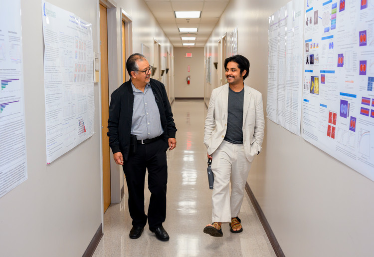 Dr.+Jose+Guardiola%2C+Professor+of+Statistics%2C+and+his+son%2C+Jose+Guardiola+Guaderrama%2C+Assistant+Professor+of+Creative+Writing