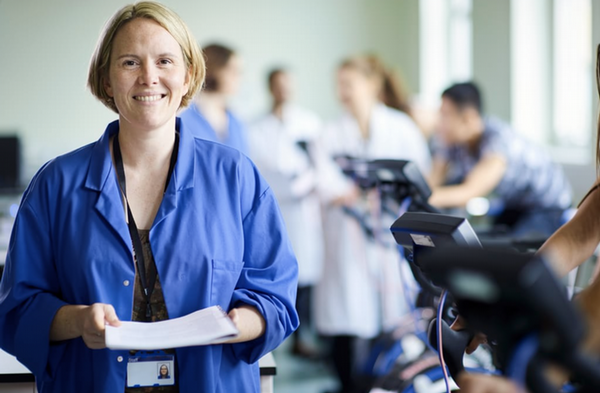 Woman working in an exercise science lab.