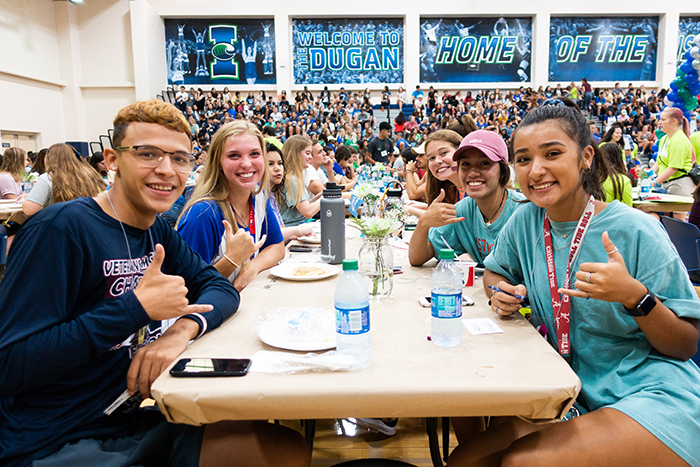 Students enjoy lunch inside the Dugan during First Wave Festivities. 