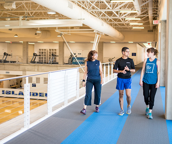 Staff walking on the Dugan walking track